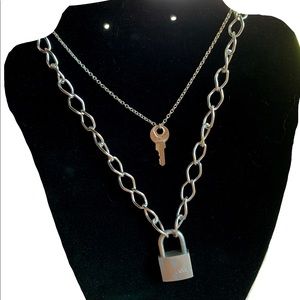 Silver chain necklace set with lock and key